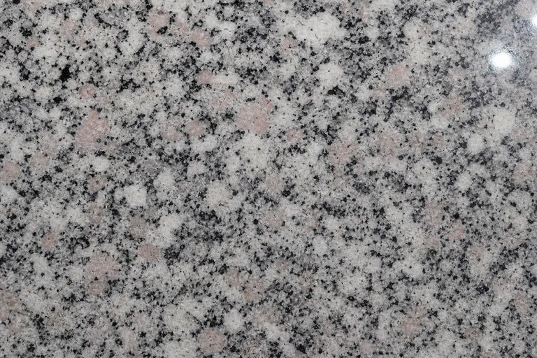 Speckled black granite countertop close-up